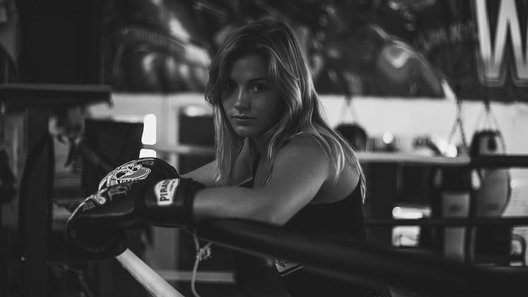 Karoliina Arm MMA fighter photoshoot posing at gym
